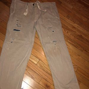 Men’s Creme ripped look True Religion Jeans